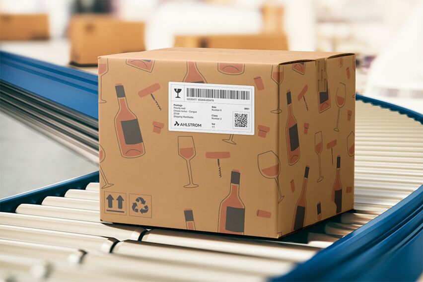 Cardboard shipping box on a conveyor belt